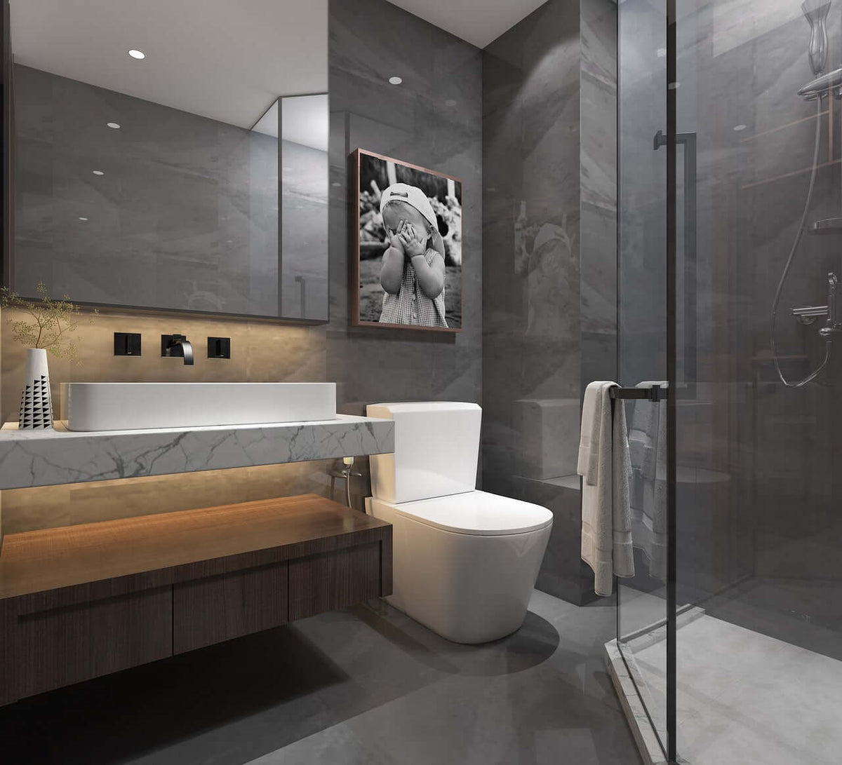 modernes Gäste-WC mit eleganter Lampe, stilvollem Waschbecken aus Marmor und geschmackvoller grauer Fliesenwand