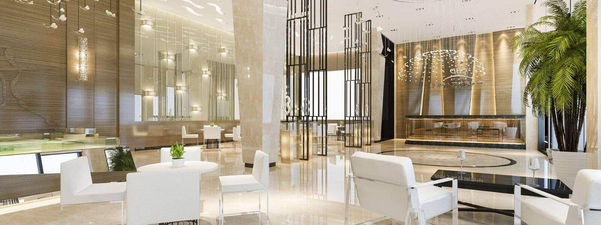 Moderne Hotel Lobby mit eleganter Beleuchtung, stilvollen Möbeln und Pflanzen für ein einladendes Ambiente.