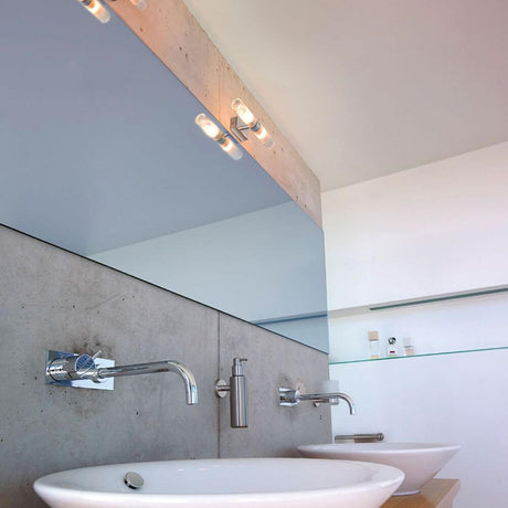 MIBO Wall Up-Down chrome 2xG9 max 2x25W IP21 in a modern bathroom with washbasin and mirror.