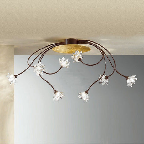 Lampa sufitowa Fiorella Gold, 8-punktowa, ramiona w stylu antycznej rdzy, 84 cm, o eleganckim designie i kryształowych lampach.