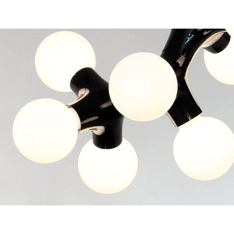DNA Quattro-9.1 pendant light black with white light sources on a black frame, modern lighting design