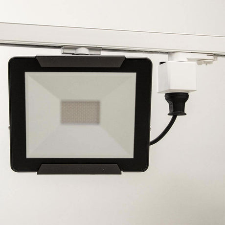 3-phase socket with adapter with earthed plug, white, LED spotlight with earthed plug, mounted on a track system.
