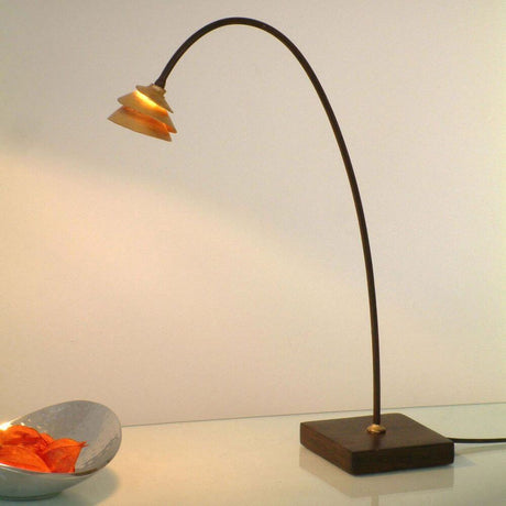 Table lamp Snail Two iron brown-black-gold with curved lamp and wooden base