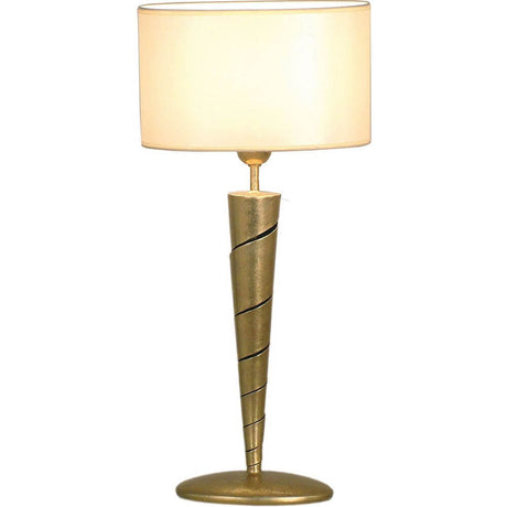 Table lamp Innovazione iron gold with modern design and a gold finish for stylish accents.