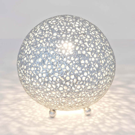 Lampada da tavolo Lily Piccolo ferro argento con design unico e delicati raggi di luce.