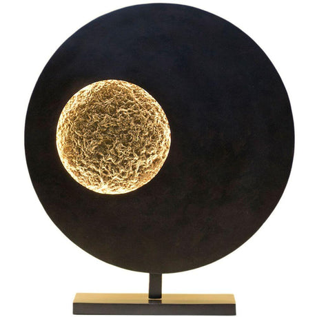 Lámpara de mesa Luna redonda de hierro marrón-negro-dorado con un diseño único y una luz cálida.