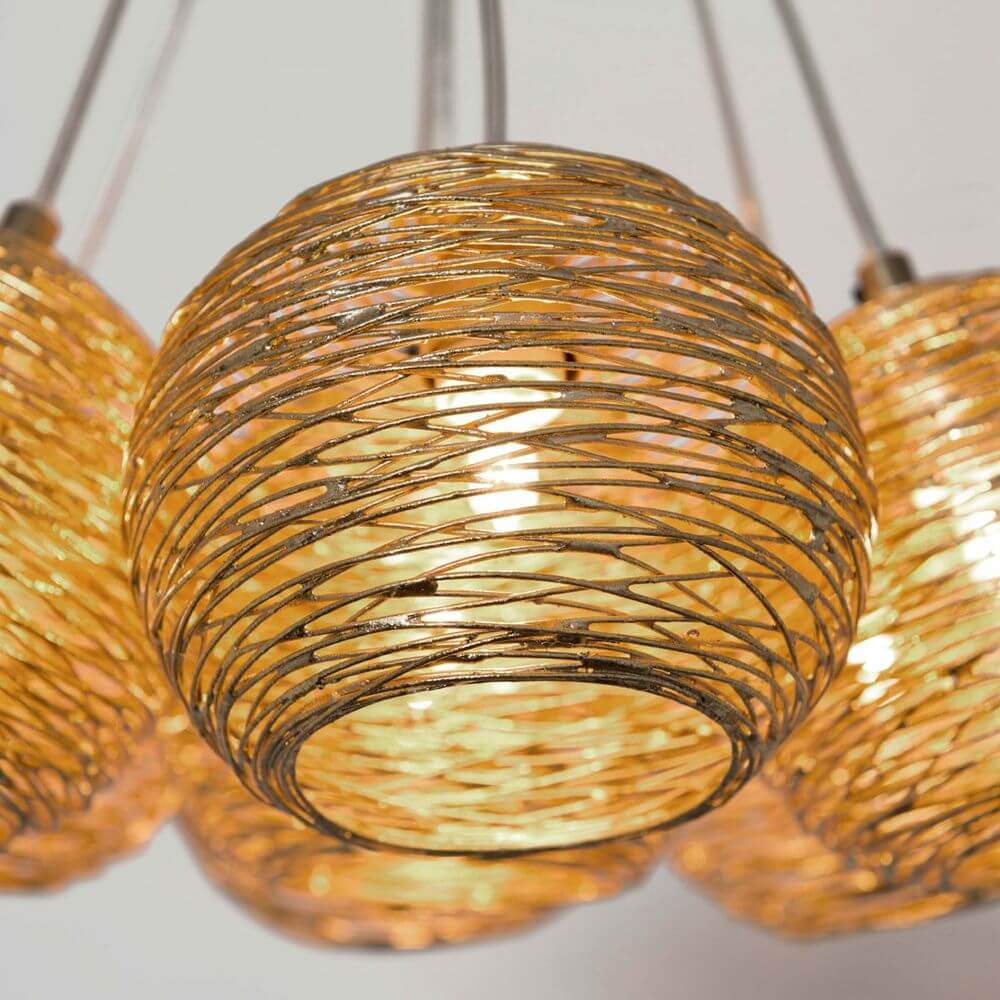 Hängeleuchte 7-flammig Carillon Eisen Gold mit ansprechendem Design und warmem Licht.