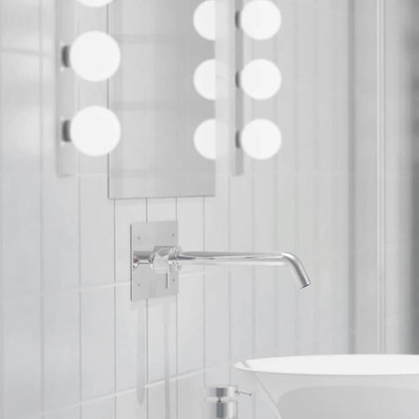 Azos mirror wall light 44cm IP44 Chrome, white on a bathroom wall with mirror and modern lights.