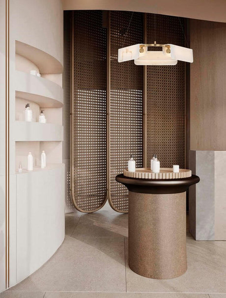 Aider 3-light pendant lamp Ø 63cm in gold above a modern reception desk, warm light, high-quality aluminum