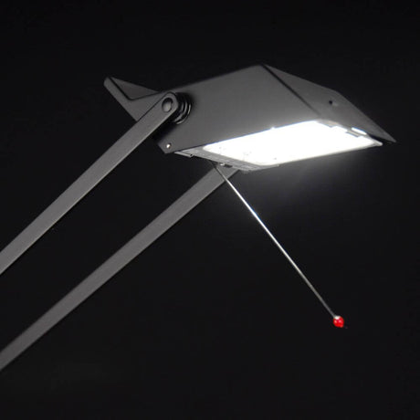 Schwarze Artemide Tizio Micro Tischlampe mit beweglichem Arm und innovativer Halogentechnik
