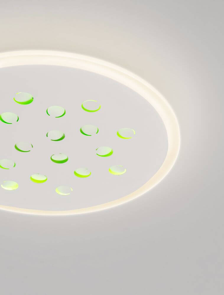 Astro LED Deckenleuchte 3000K Weiß mit dekorativen grünen Akzenten auf dem Lampenschirm.
