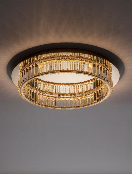 Aurelia LED Deckenleuchte in Gold mit elegantem Design und Glasstäben, blendfrei und modern.