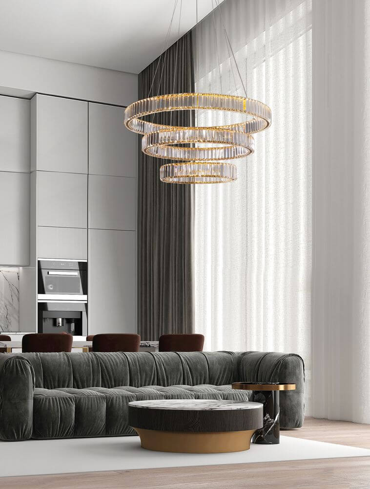 Aurelia LED Pendelleuchte Ø 80cm 3500K hängt über einem eleganten Sofa in modernem Wohnraum.