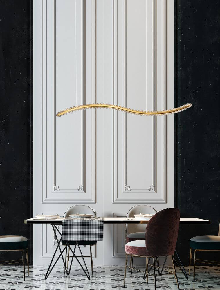 Aurelia LED Pendelleuchte 3500K über einem modernen Esstisch in elegantem Raumdesign.