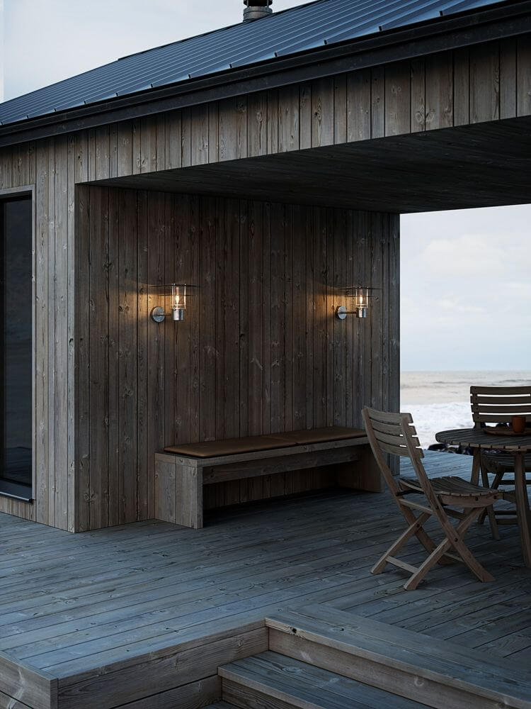 Außenwandlampe Bastia 35 IP54 an einer Holzfassade, ideal für Außenbereiche.