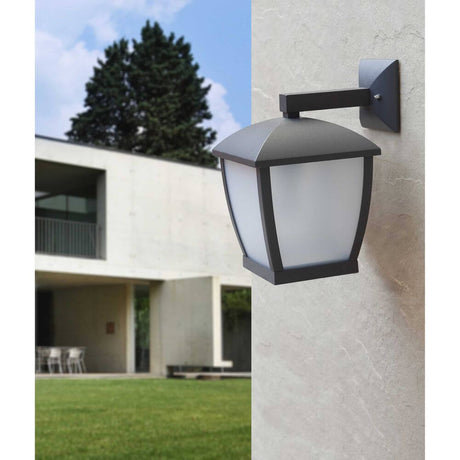 WILMA outdoor wall light IP44 Dark grey on a modern house wall with green lawn in the background.