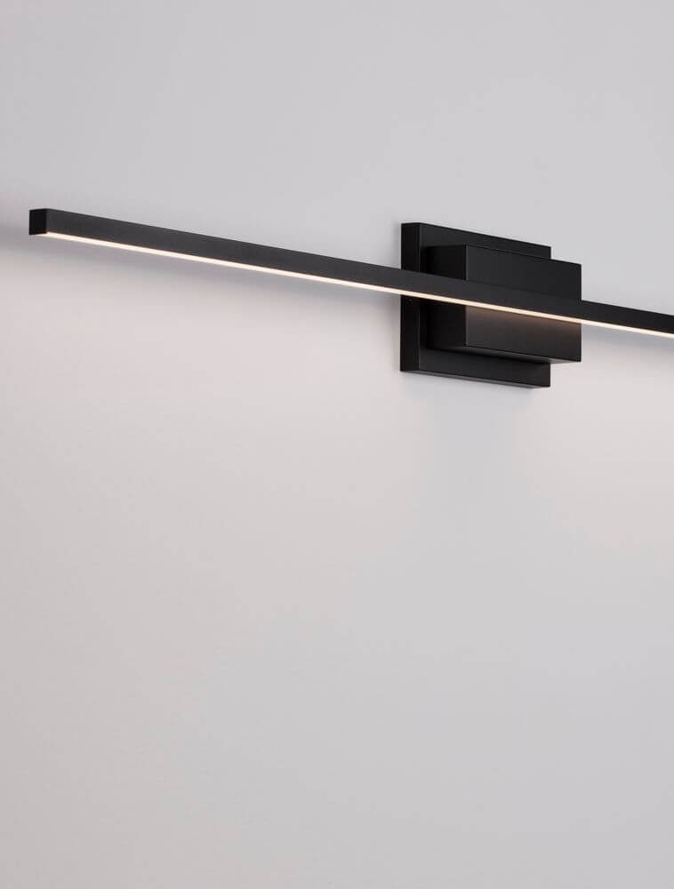 Azure LED Wandleuchte 3000K Schwarz an der Wand, modernes Design in Schwarz, hochwertige Kunststoffleuchte.