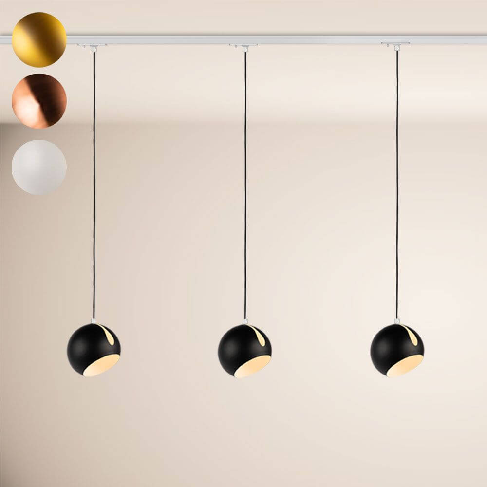 s.luce Ball Esszimmerlampe in Schwarz mit drei Hängeleuchten, ideal für modernes Esszimmerdesign.