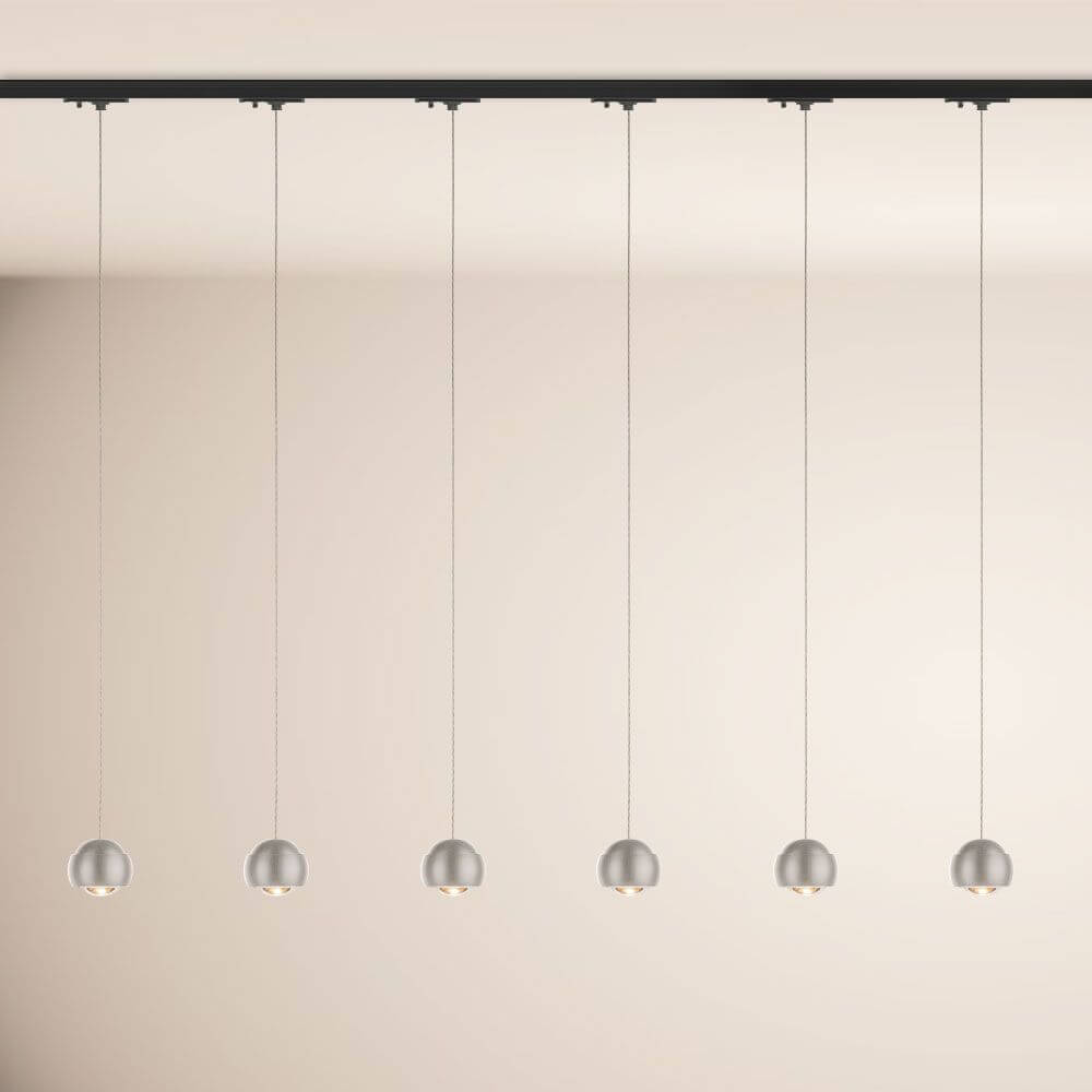 s.luce Beam LED Hängelampe 1-Phasen-Schienensystem Mitteleinspeiser in einem modernen Raum