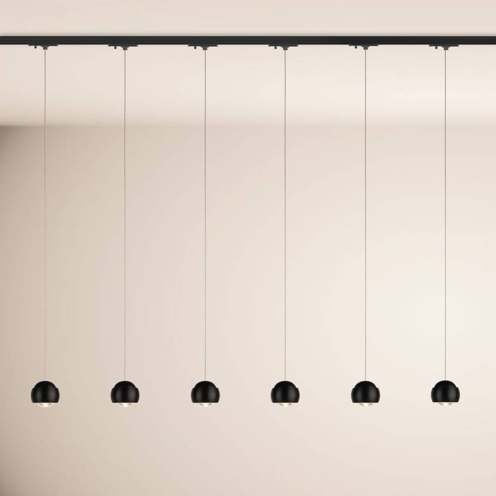 s.luce Beam LED Hängeleuchte 1-Phasen-Schienensystem Endeinspeiser mit mehreren schwarzen Pendellampen.