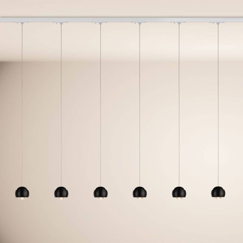 s.luce Beam LED Hängeleuchte 1-Phasen-Schienensystem Endeinspeiser in modernem Design mit mehreren Lampenschirmen.