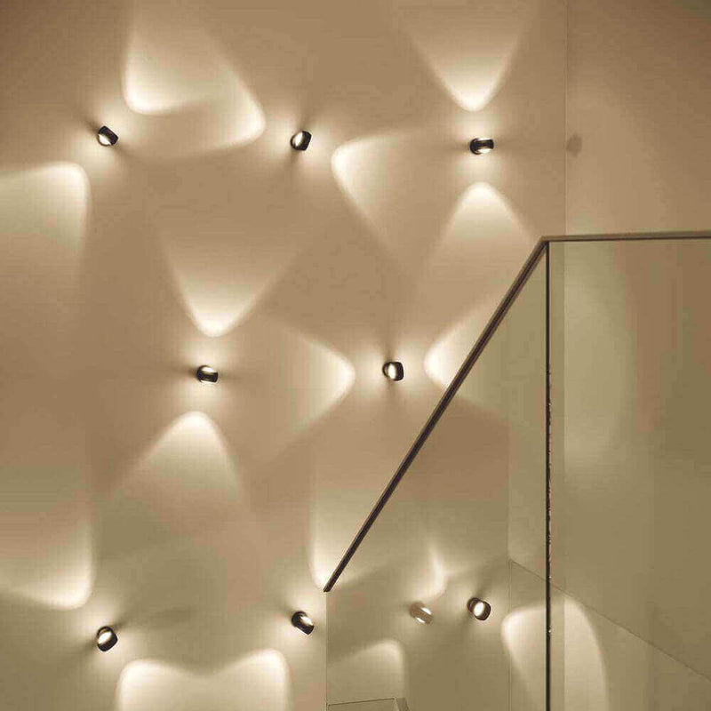 Modern wall lighting with interesting light patterns that create an elegant atmosphere.