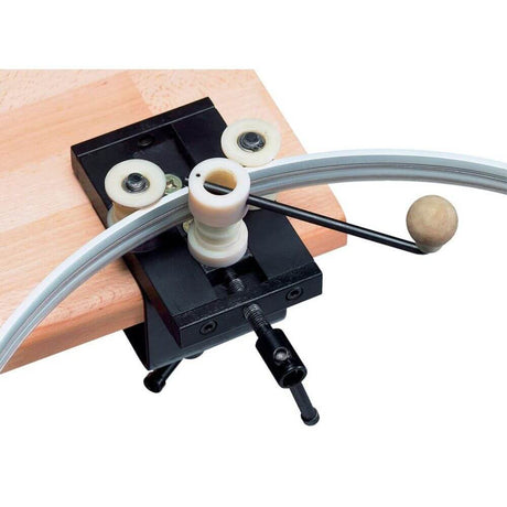 Bending machine for Easytec II with round-arc bending mechanism on a wooden surface.
