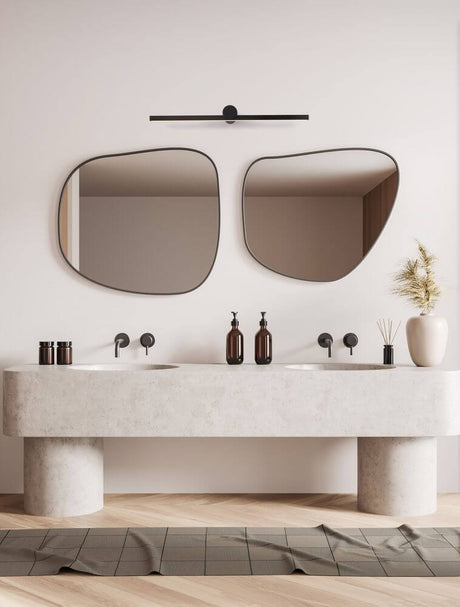 Elegant Breggo wall light 81cm 3000K IP54 above modern bathroom mirrors.