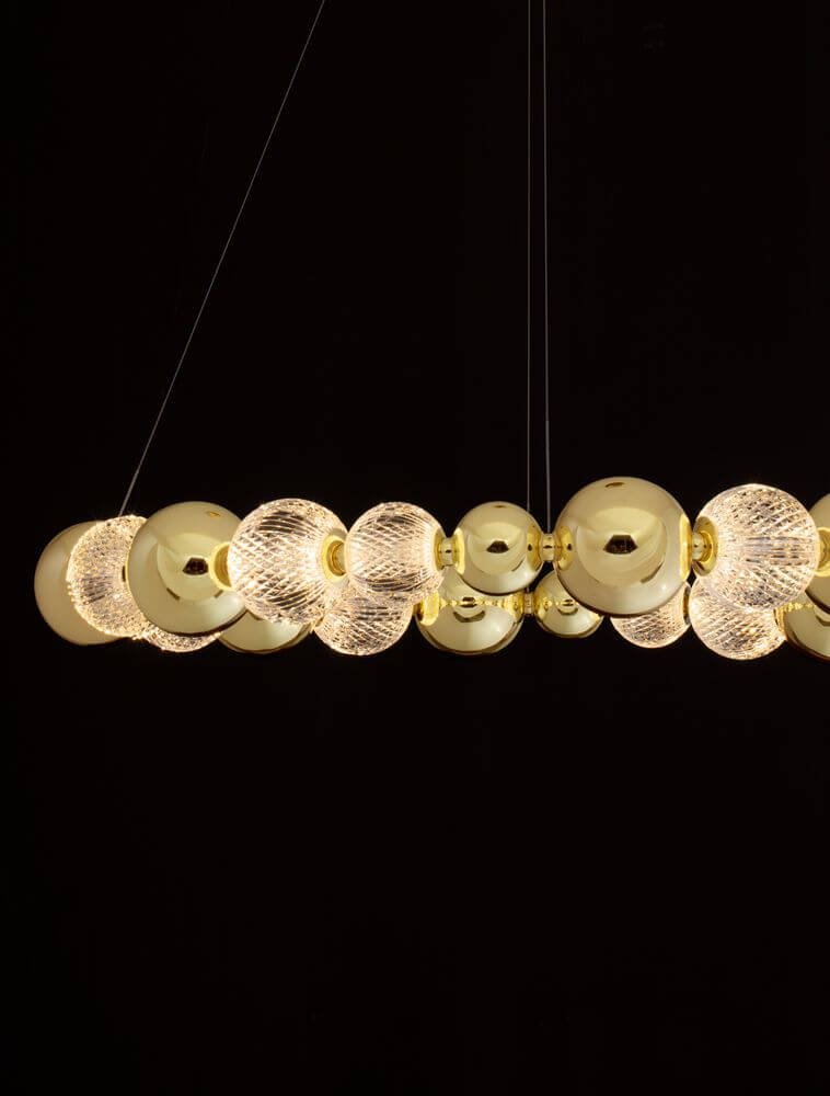 Brille LED Pendelleuchte 12-flammig Ø 94cm 3200K Gold, elegante Goldleuchte mit klaren Glaskugeln.