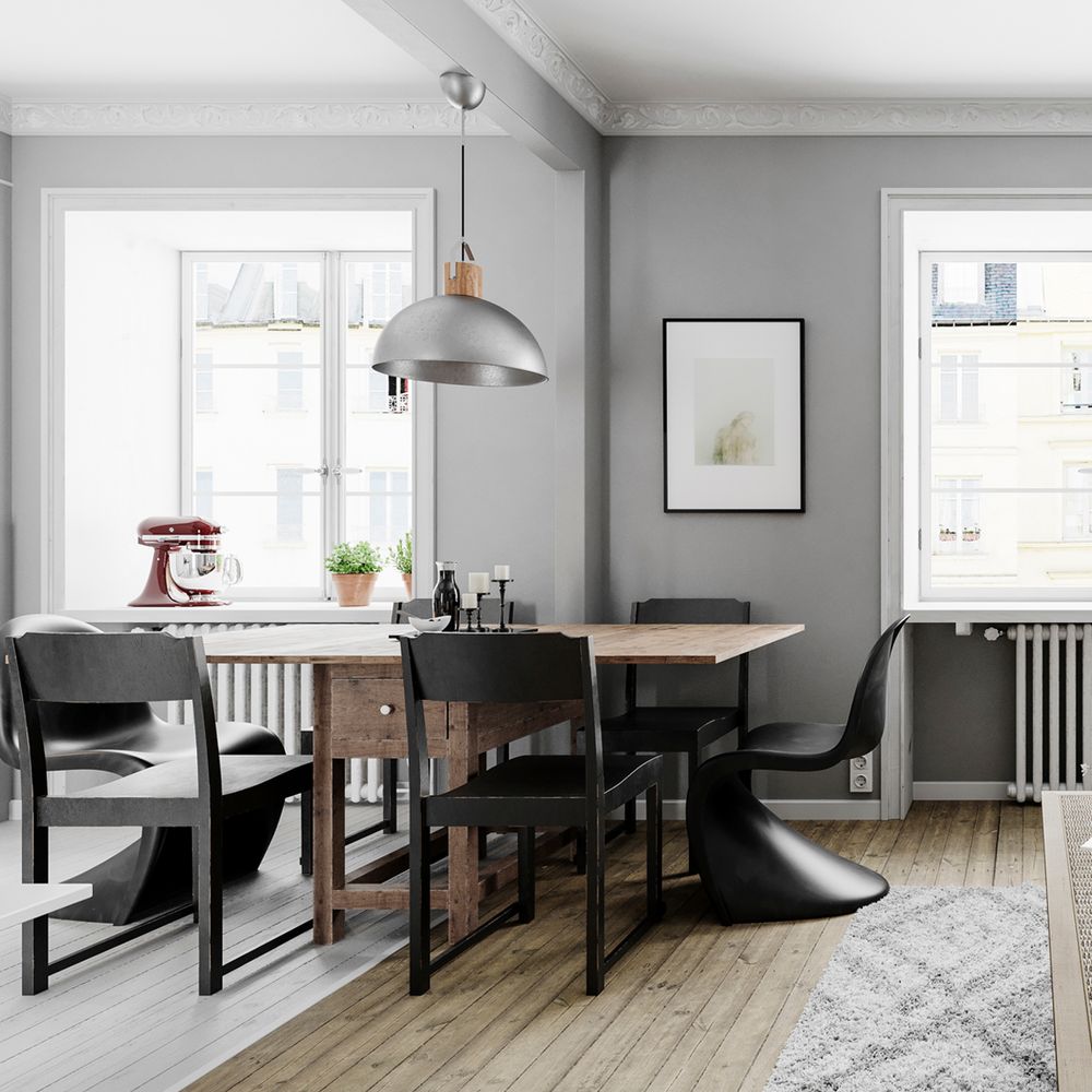 Buckler Pendelleuchte Ø 45cm über einem rustikalen Esstisch in modernem Interieur.