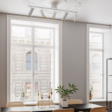 Takspotlight Puls med 5 ljuskällor i ett modernt rum med elegant fönstervy.