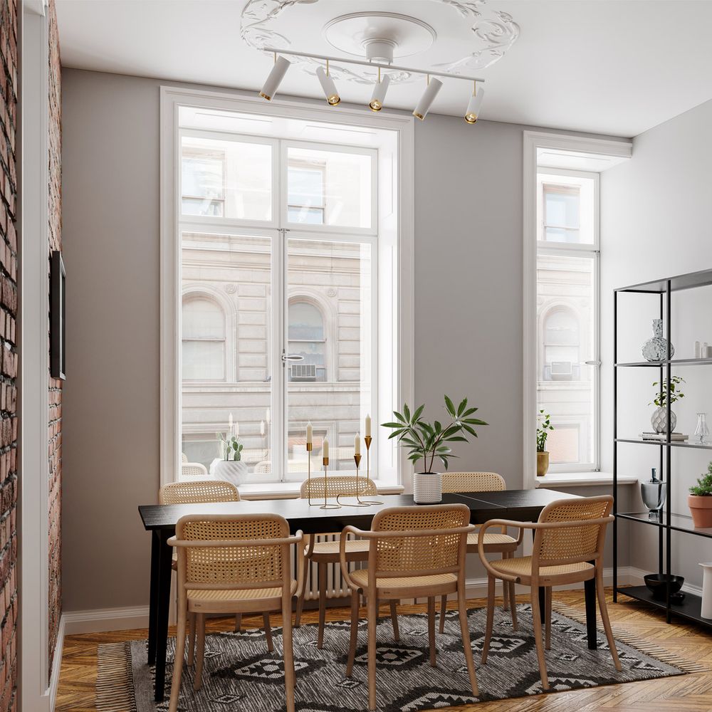 Deckenstrahler Puls 5-flammig in einem modernen Esszimmer mit eleganter Beleuchtung.