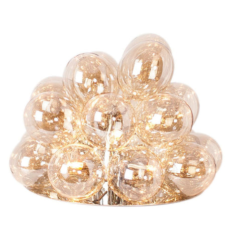 Large glass table lamp Ø 38cm amber with decorative glass spheres in warm light.