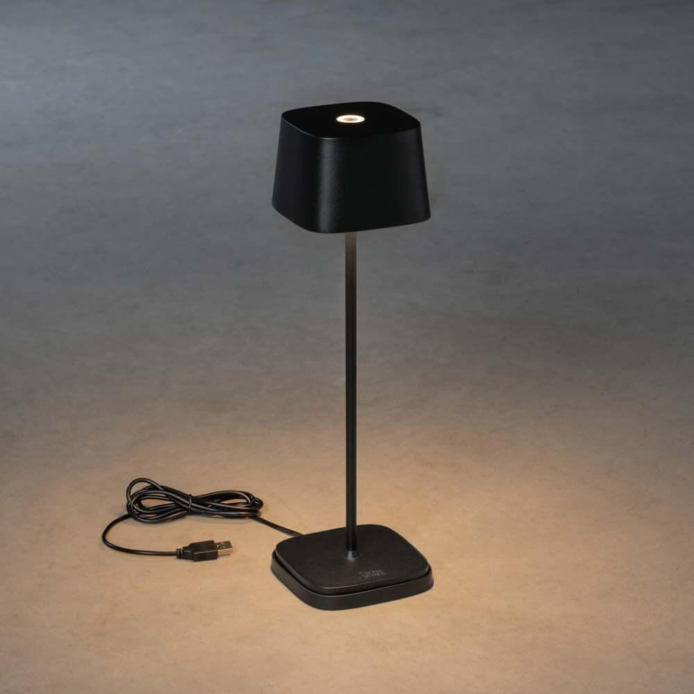 Capri USB-Tischleuchte IP54 in Schwarz, dimmbares Licht und wechselbare Lichtwärme.