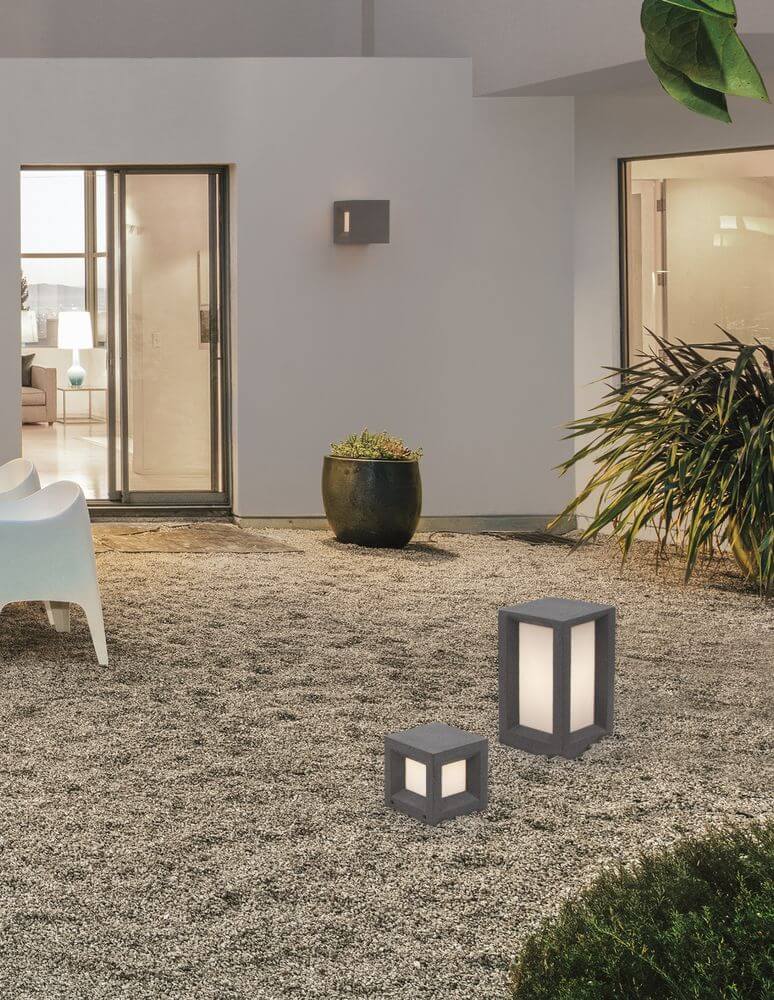 Castro Außensockelleuchte E27 IP65 im modernen Garten, ideal für Außenbereiche und Terrasseneinrichtungen.