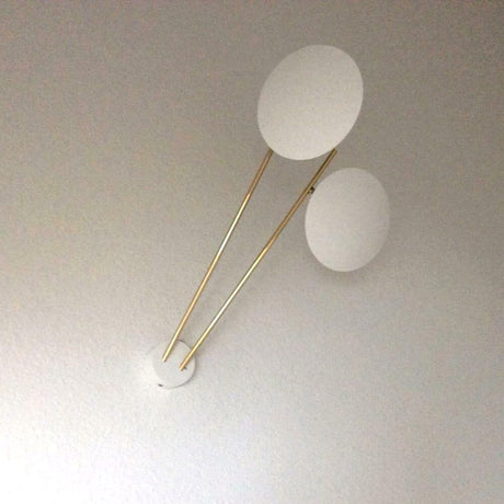 Catellani & Smith Lederam C2 LED Wand & Deckenleuchte mit eleganten, sanften Linien und warmen Farbtönen.