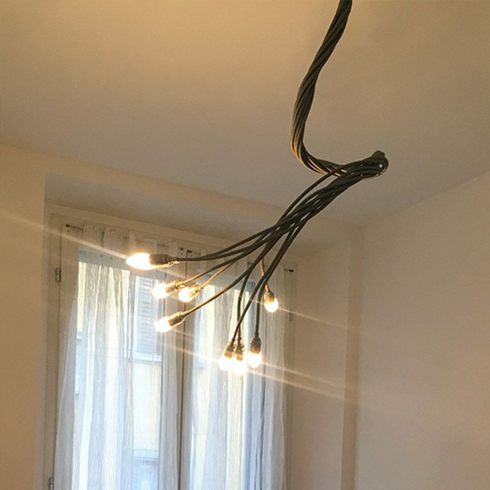 Catellani & Smith Turciù 9 LED Deckenlampe flexibles Design mit einzelnen Lichtquellen in modernem Innenraum.