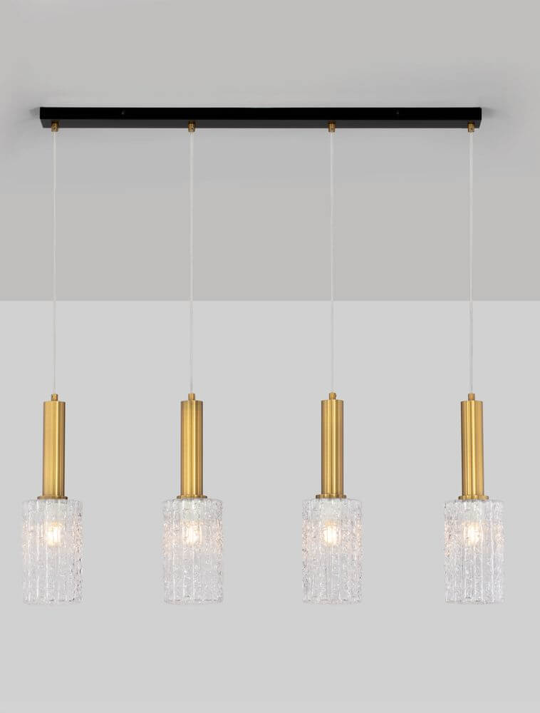 Certa Pendelleuchte 4-flammig Schwarz, Gold mit transparenten Glaszylindern und goldenen Aluminiumrohren.