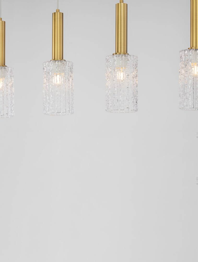 Certa Pendelleuchte 4-flammig Schwarz, Gold mit transparenten Glaszylindern und filigranen goldenen Rohren.