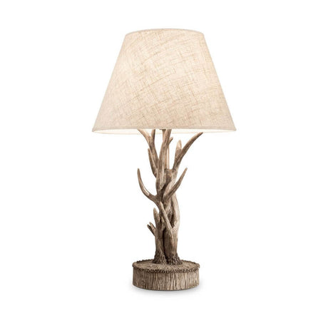 Chalet wood antler table lamp with artisan-crafted resin and carved wood, perfect living room lighting.