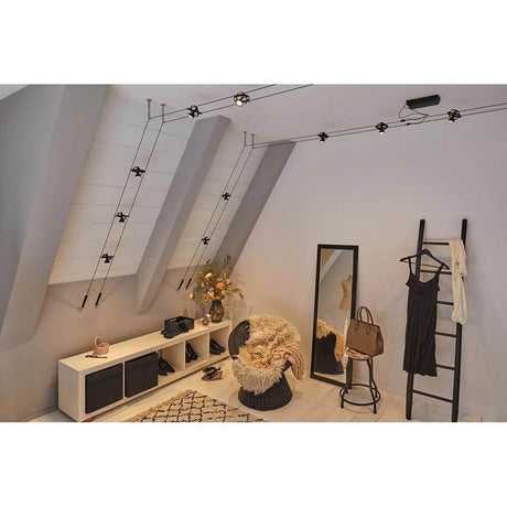 CorDuo cable system basic set, matt black, installed in a modern room with decor.
