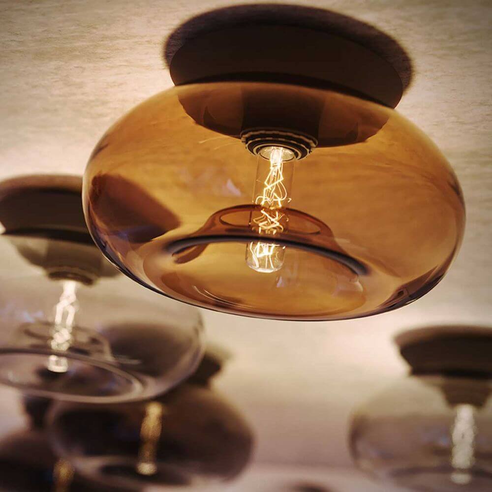 s.luce Cruet Glas Wand- und Deckenleuchte Up & Low in modernem Design mit bernsteinfarbenem Glas.