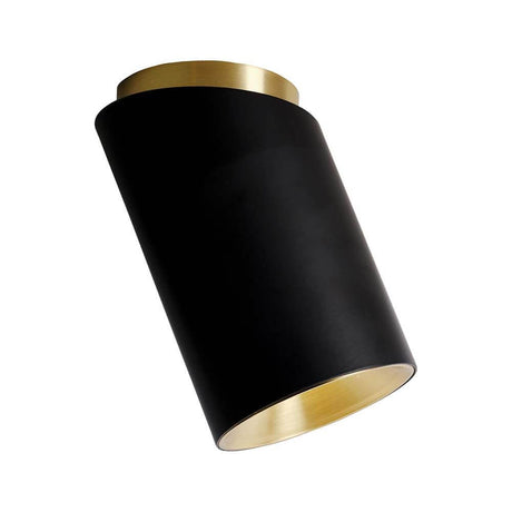 DCWéditions Tobo plafonnier en saillie incliné au design moderne avec boîtier noir et intérieur doré.