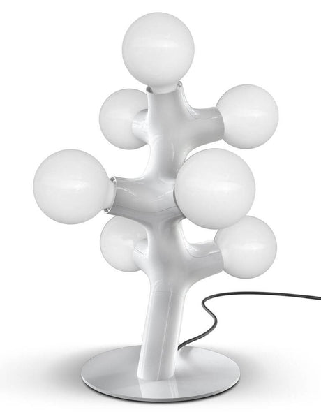 DNA Triple-7 table lamp White with organically growing, white plastic modules and light sources.