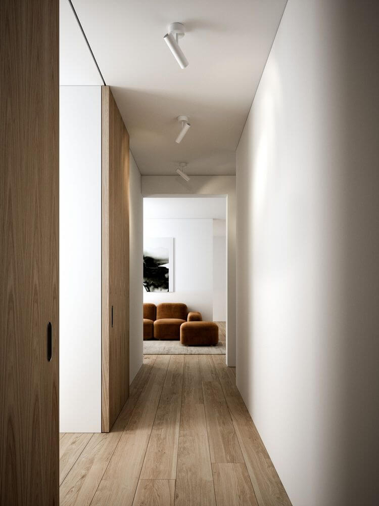 Moderne Innentreppe mit minimalistischer Deckenleuchte MIB, Holzfarbe und elegantem Design.