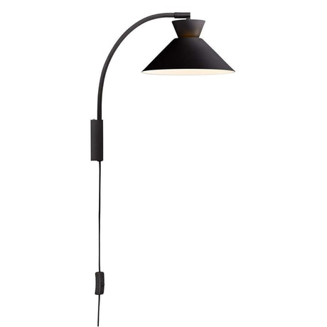 Dial wall light with a curved bracket and geometric shade, inspired by 1950s design.