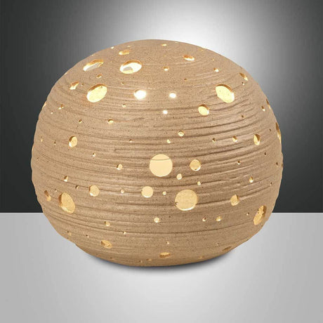 Corvara Tischleuchte Ø 20cm in originellem Design mit Lichtausschnitten für stimmungsvolle Beleuchtung.