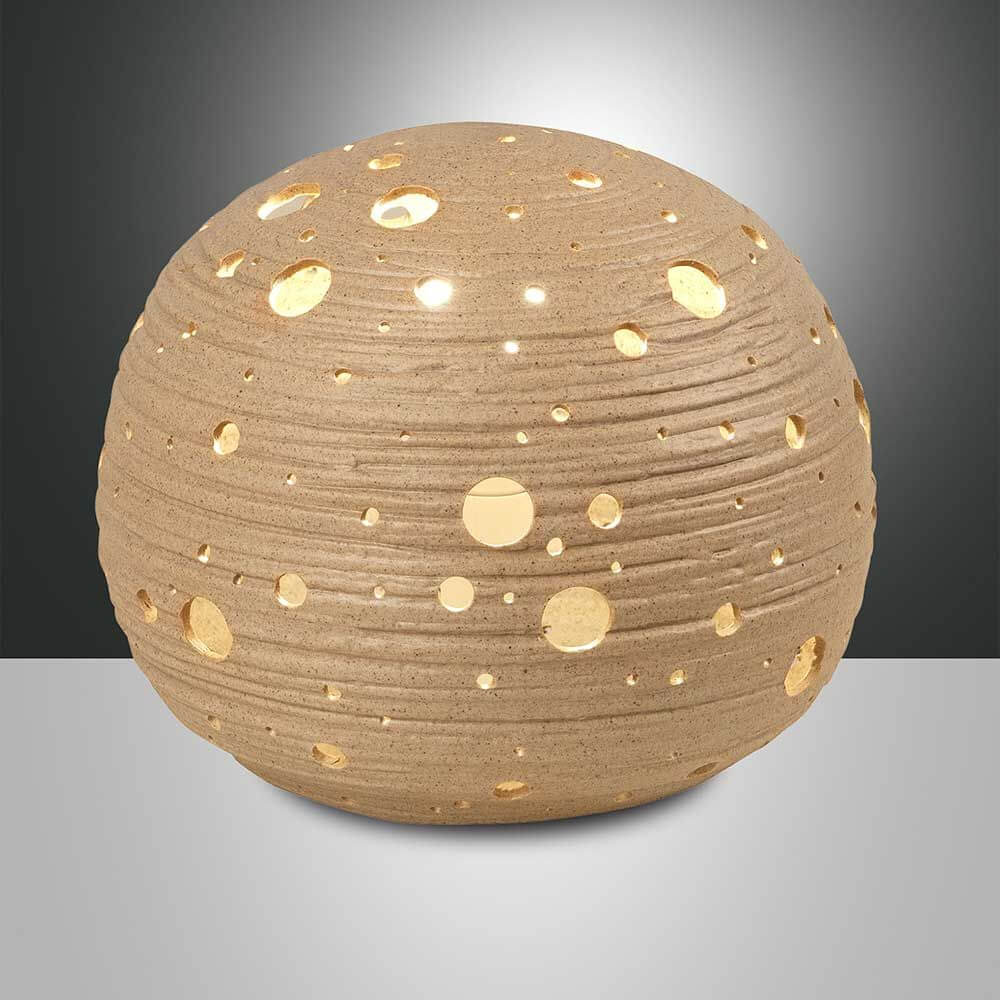 Corvara Tischleuchte Ø 20cm in originellem Design mit Lichtausschnitten für stimmungsvolle Beleuchtung.