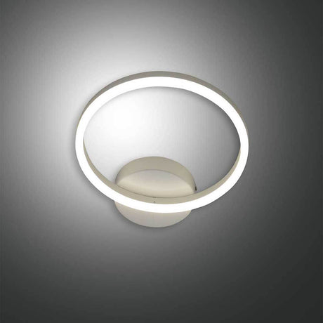 LED Wandleuchte Giotto Ø 30cm in modernem Design mit sanftem Lichtschein auf grauem Hintergrund.