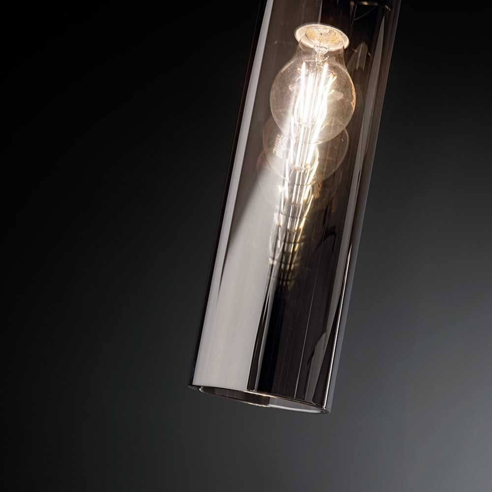 Sintesi Pendelleuchte Ø 10cm in transparenter Glaskonstruktion mit warmem Licht.